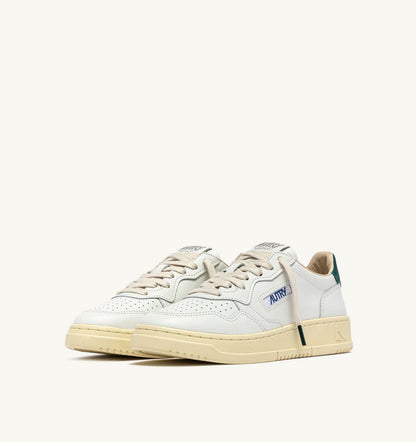 MEDALIST LOW SNEAKERS IN WHITE LEATHER AND DARK SEA SUEDE - AUTRY Latest