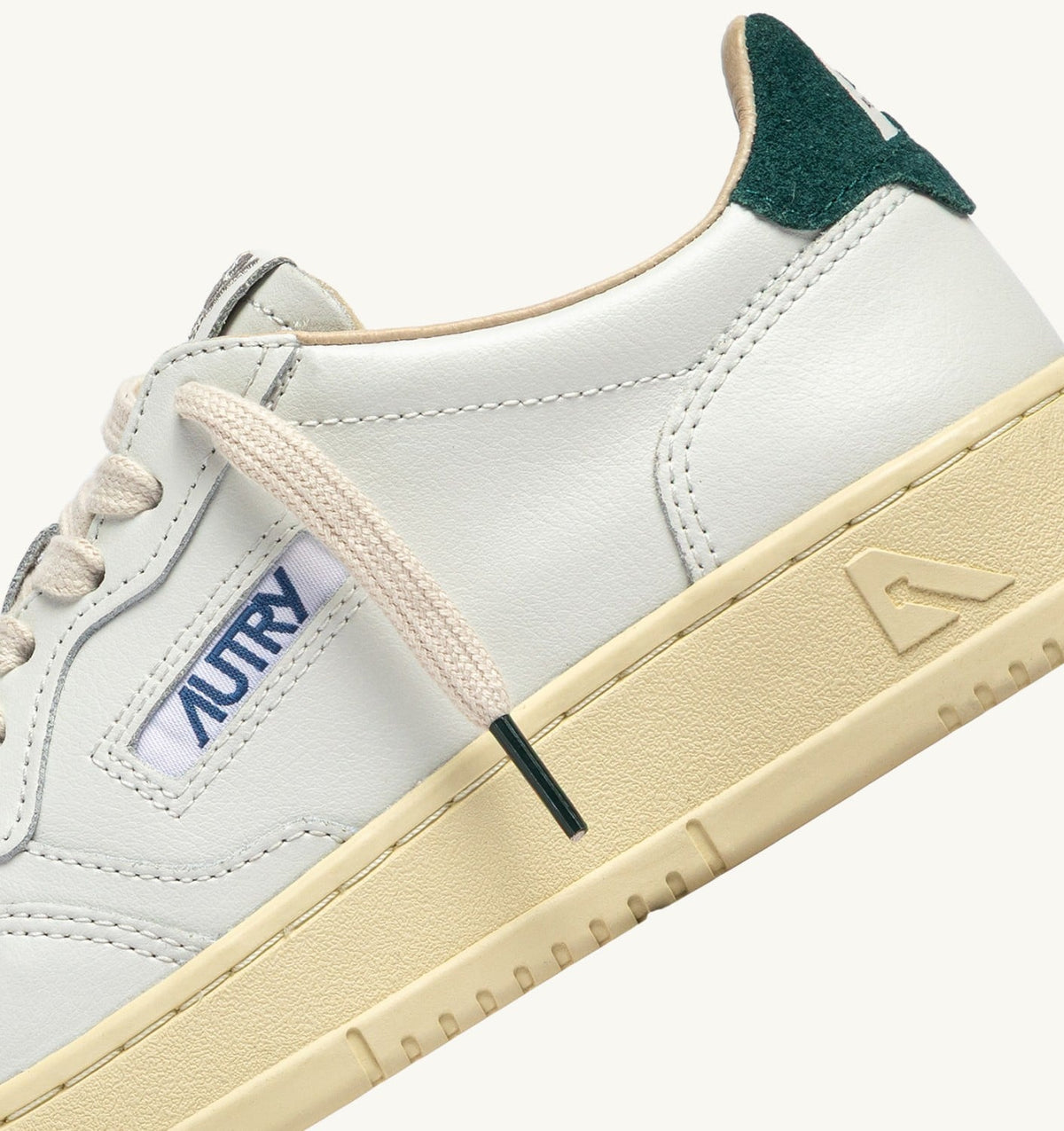 MEDALIST LOW SNEAKERS IN WHITE LEATHER AND DARK SEA SUEDE - AUTRY Latest