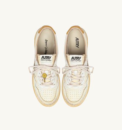 MEDALIST LOW SUPER VINTAGE SNEAKERS IN WHITE AND YELLOW LEATHER - AUTRY Essential