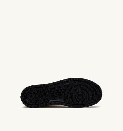 GOLF LOW SNEAKERS IN LEATHER COLOR WHITE AND BLACK - AUTRY Essential