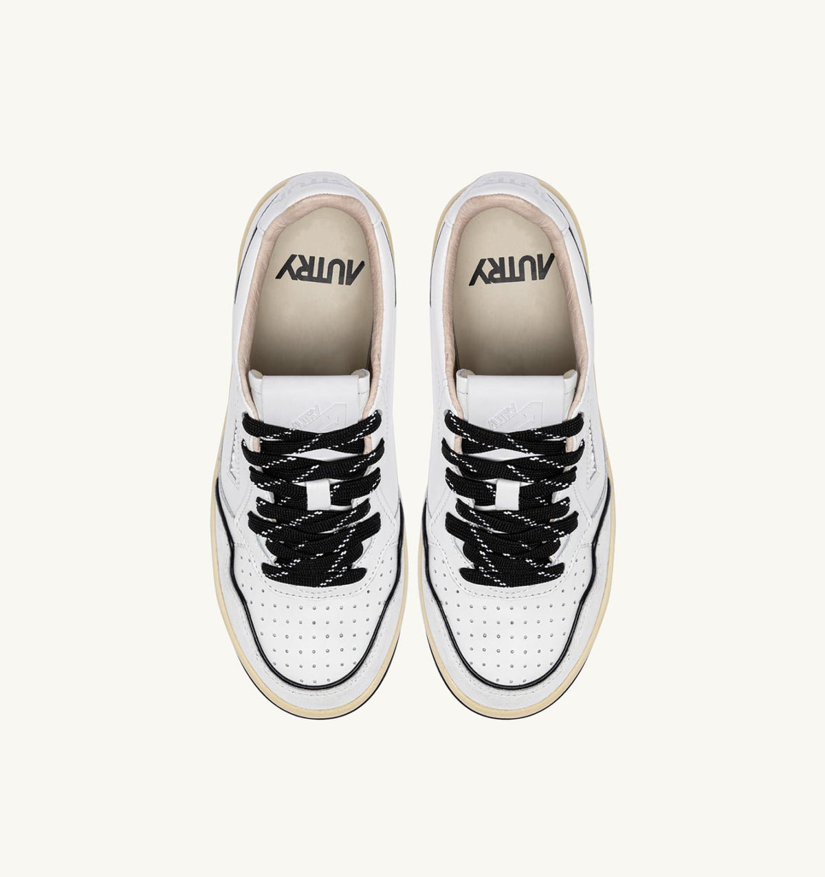 GOLF LOW SNEAKERS IN LEATHER COLOR WHITE AND BLACK - AUTRY Essential