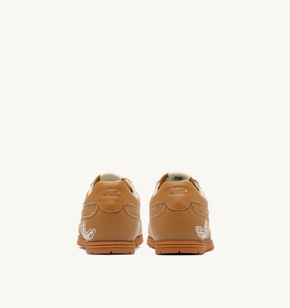 WINDSPIN SNEAKERS IN EARTH LEATHER WITH DECORATIONS - AUTRY Classic