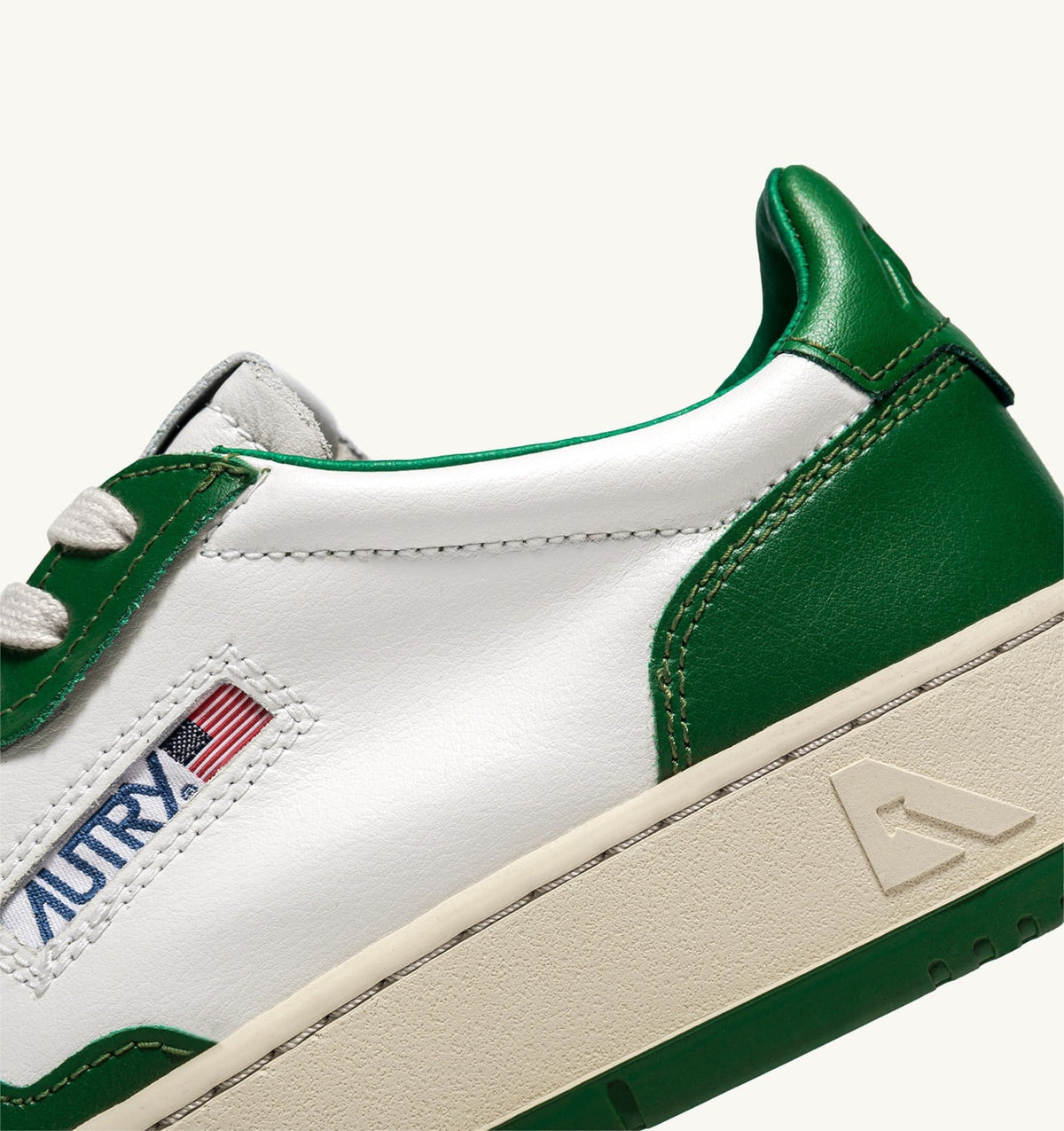 MEDALIST LOW BICOLOR SNEAKERS IN WHITE AND GREEN LEATHER - AUTRY Latest