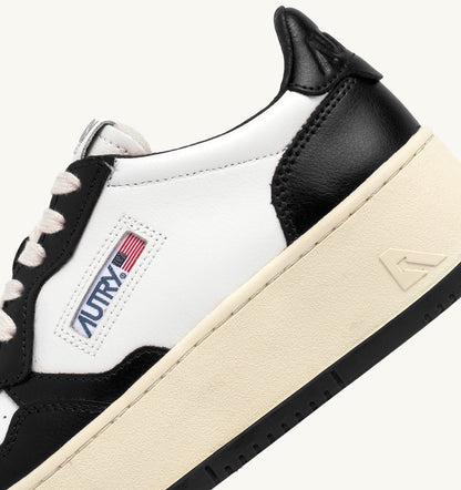 MEDALIST PLATFORM SNEAKERS IN WHITE AND BLACK LEATHER - AUTRY Everyday